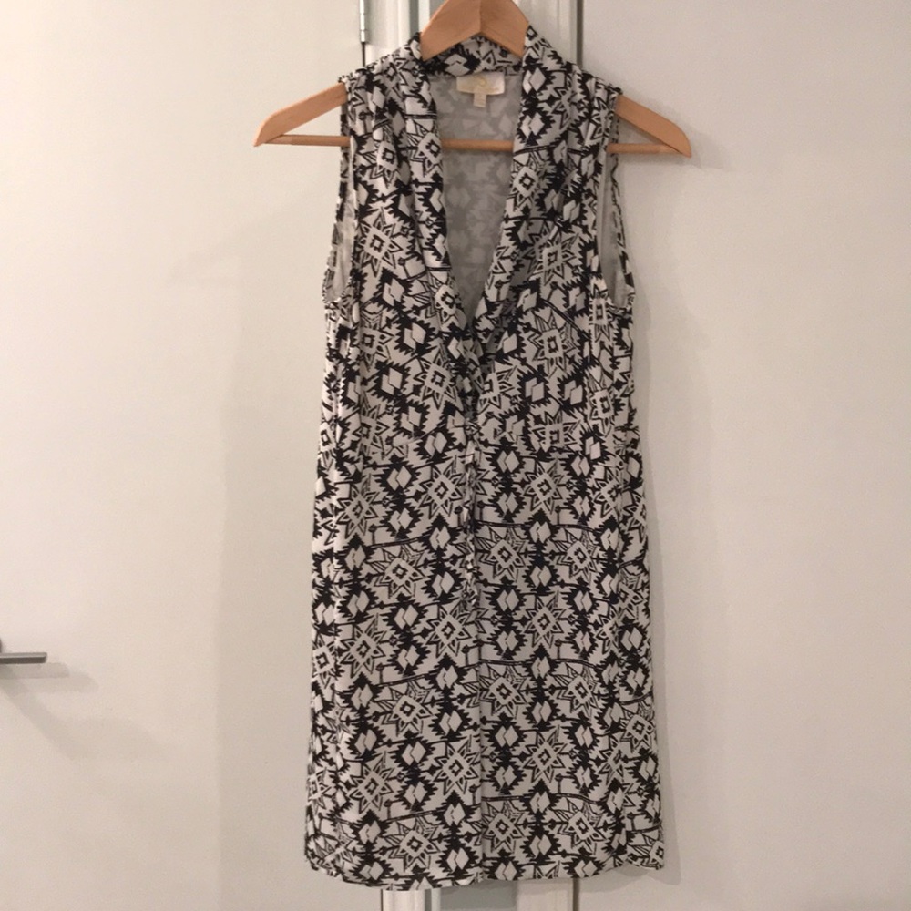Geometric-patterned baby doll dress.